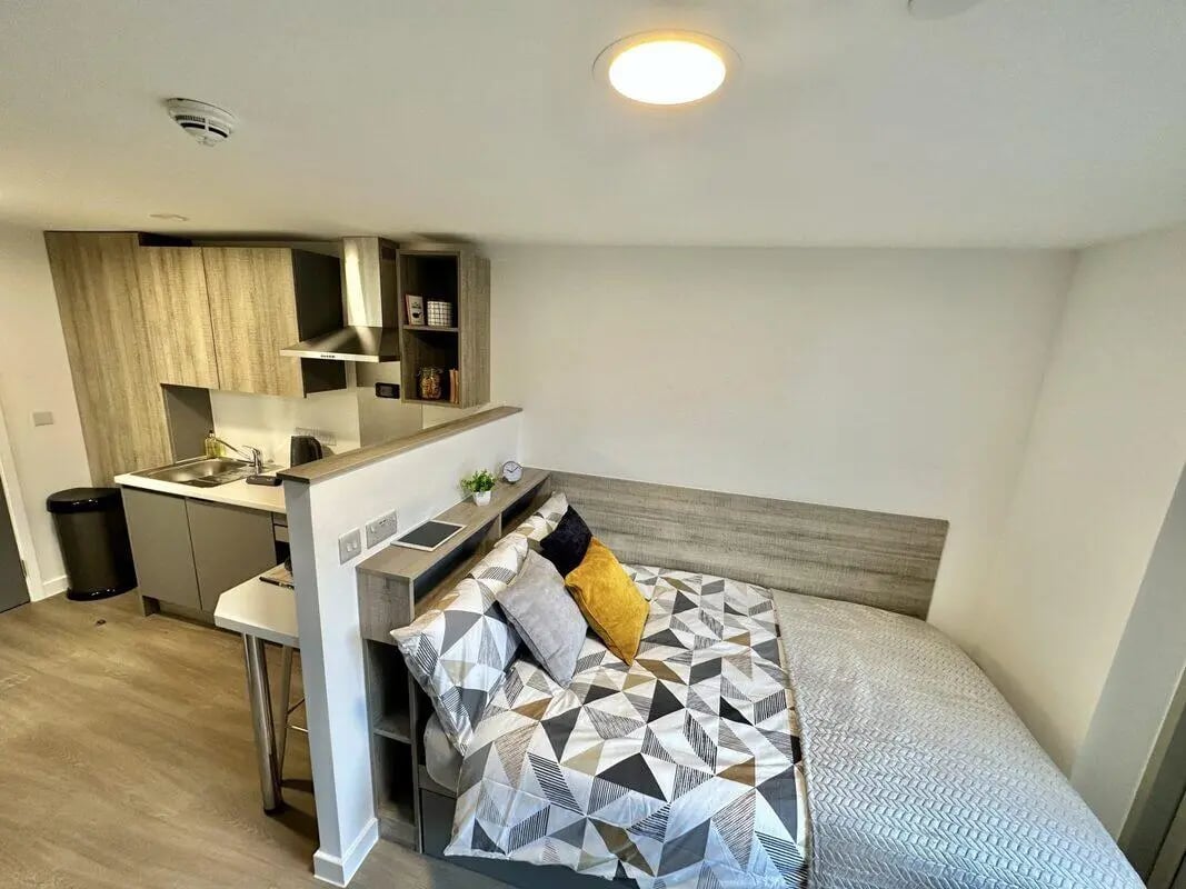 Studio apartment with bed kitchen and desk study area at Albany Student Village in Coventry Student Accommodation