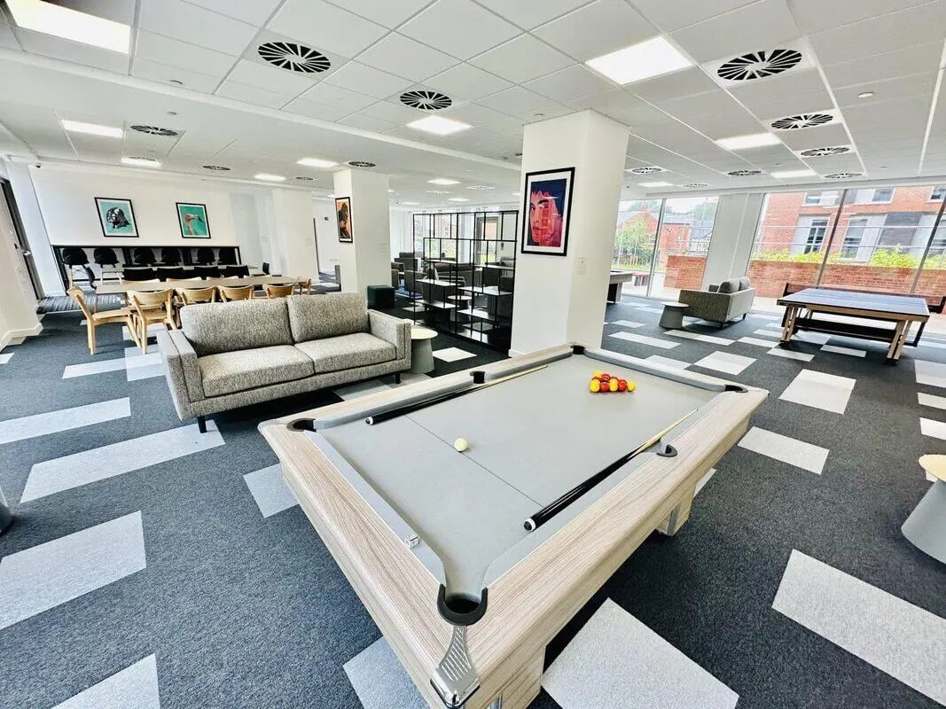 Pool table sofa dining area common room at Albany Student Village in Coventry Student Accommodation
