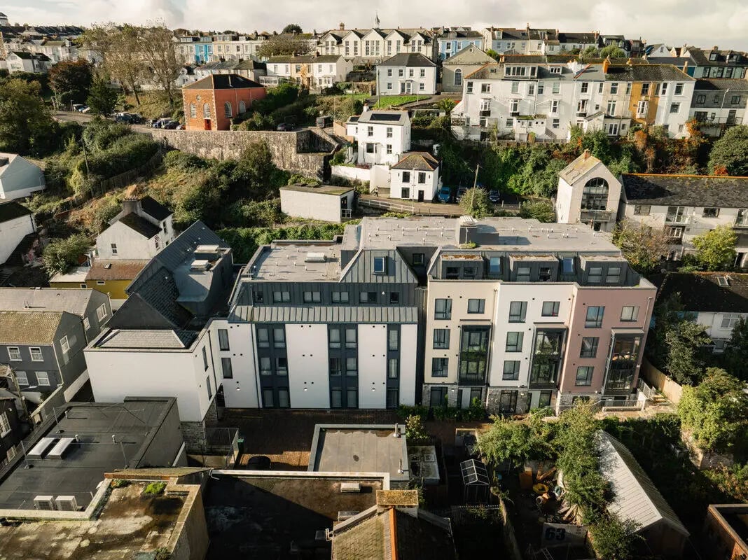 Modern student accommodation building with multiple windows exterior at Hydrogen Falmouth in Falmouth Student Accommodation