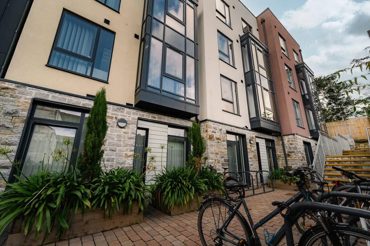 Modern student accommodation exterior with bikes exterior at Hydrogen Falmouth in Falmouth Student Accommodation