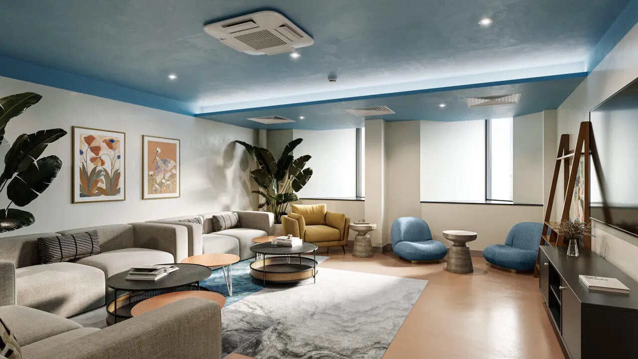 Sofas coffee tables and chairs living room at B16 Studios in Birmingham Student Accommodation