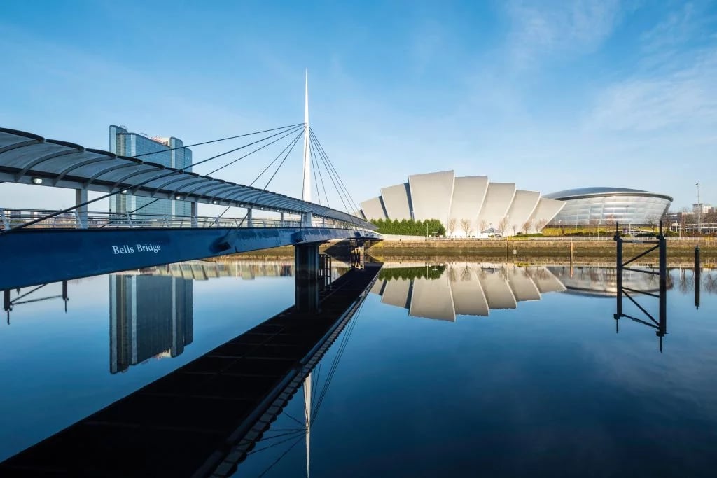 Bells Bridge and modern buildings reflected exterior at West Village in Glasgow Student Accommodation