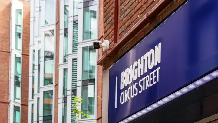 Security camera and Brighton Circus Street sign exterior at Kaplan Living Brighton in Brighton Student Accommodation