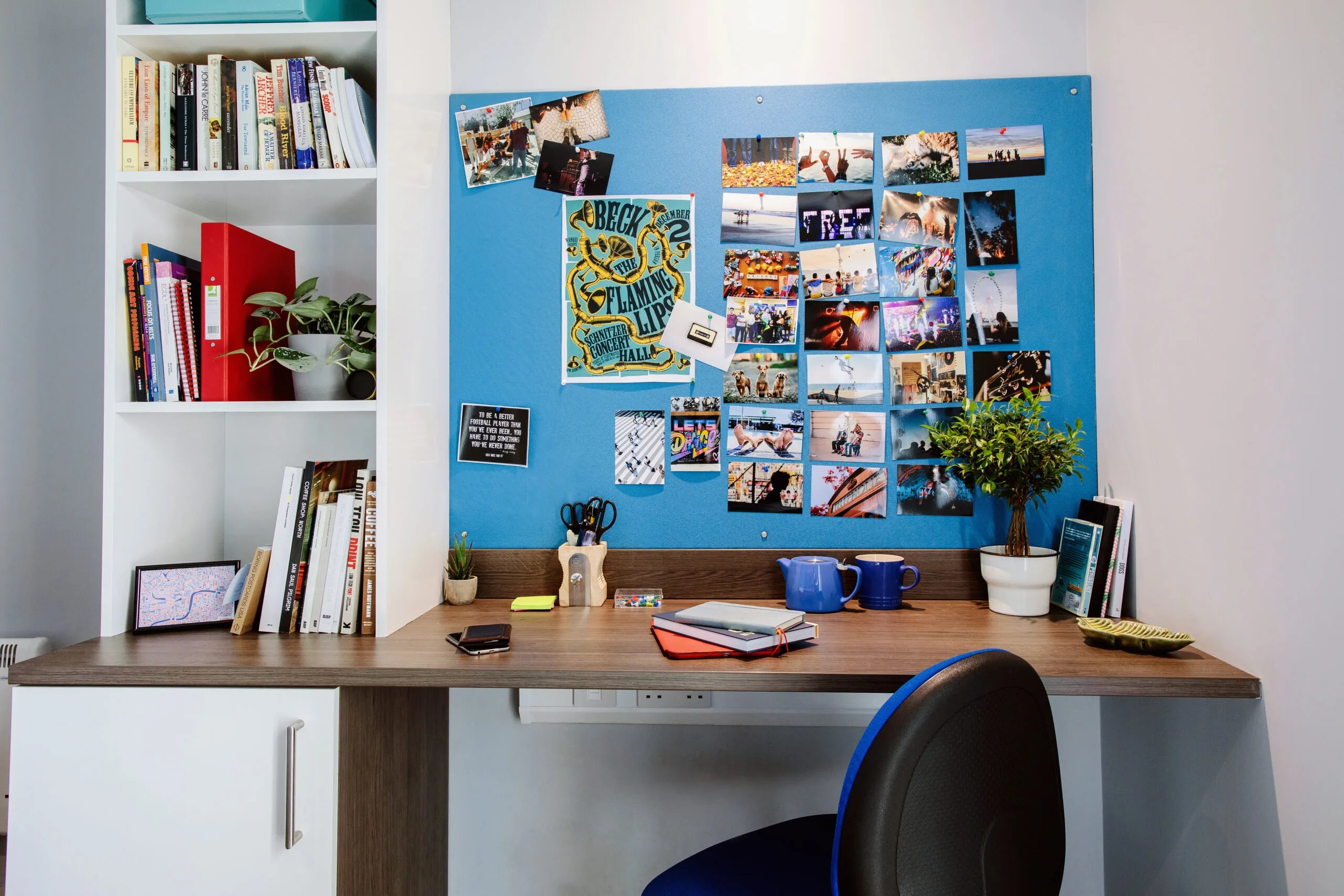 Desk with photos books and plants Study area at Kaplan Living Bournemouth in Bournemouth Student Accommodation