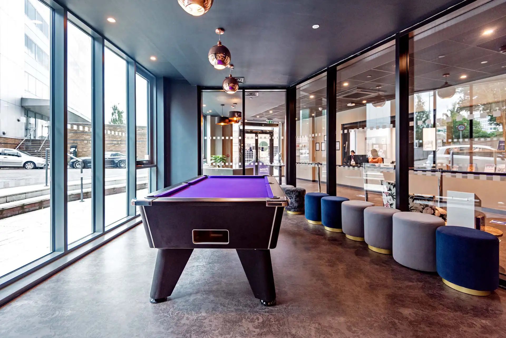 Pool table and ottomans common area at Trinity View Coventry in Coventry Student Accommodation