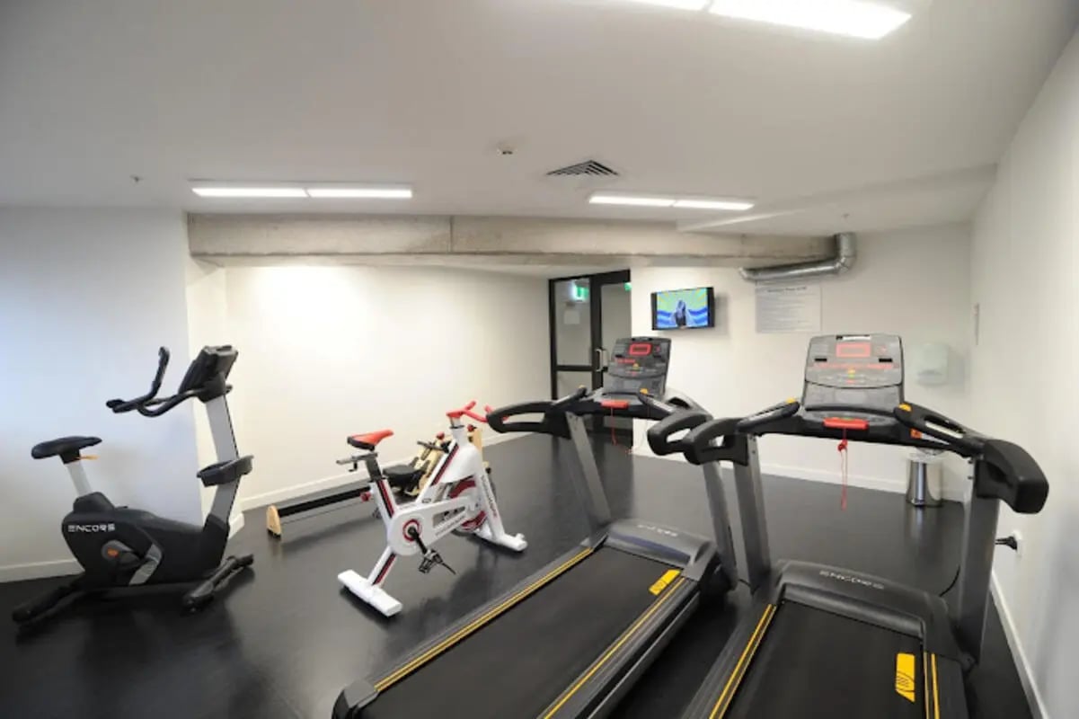 Treadmills exercise bikes and rowing machine fitness room at UniLodge Auckland City in Auckland Student Accommodation