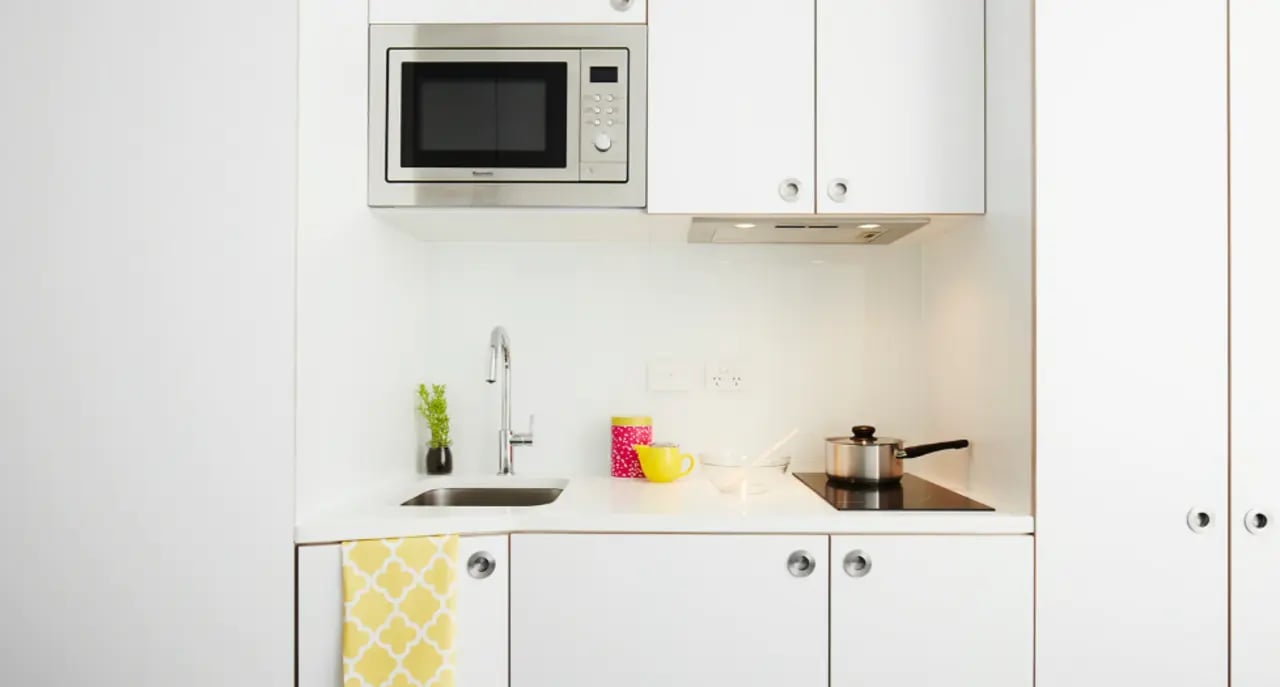 Microwave sink pot yellow cup kitchen at Scape Abercrombie in Sydney Student Accommodation