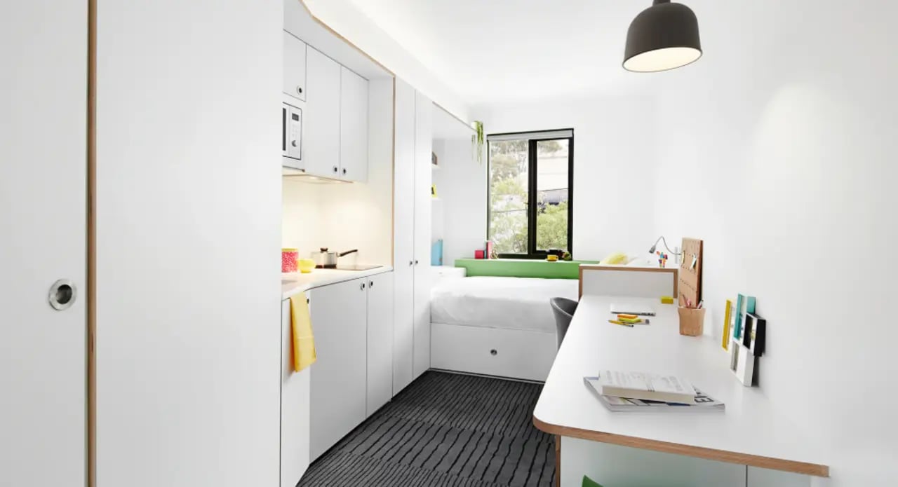 Bed desk microwave kitchen and bed room at Scape Abercrombie in Sydney Student Accommodation