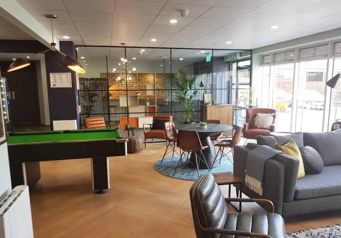 Pool table sofas table chairs living area at Buchanan View in Glasgow Student Accommodation