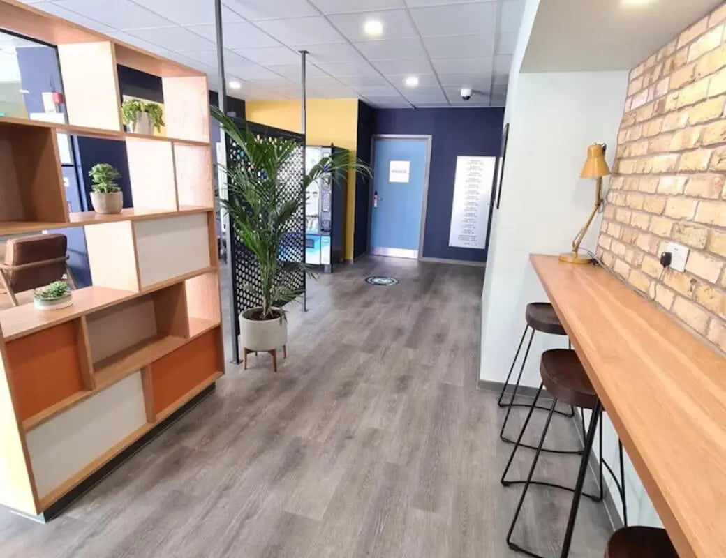 Shelving plant stools and long desk communal area at Buchanan View in Glasgow Student Accommodation