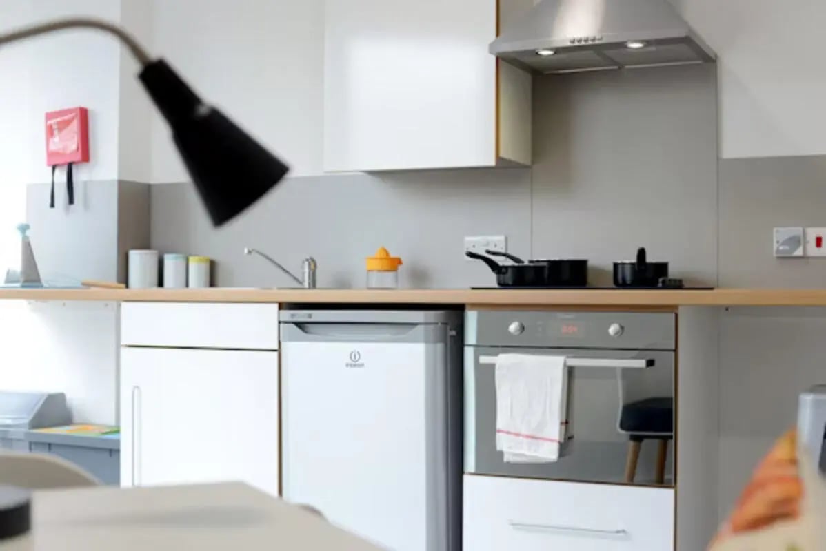 Kitchen with hob oven and small fridge kitchen at Buchanan View in Glasgow Student Accommodation