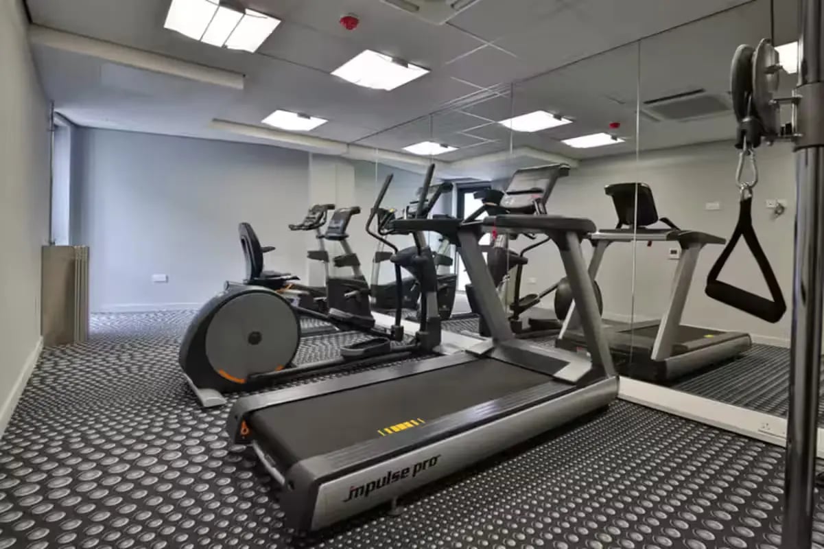 Treadmills elliptical bikes gym equipment gym area at St Peter Studios in Aberdeen Student Accommodation