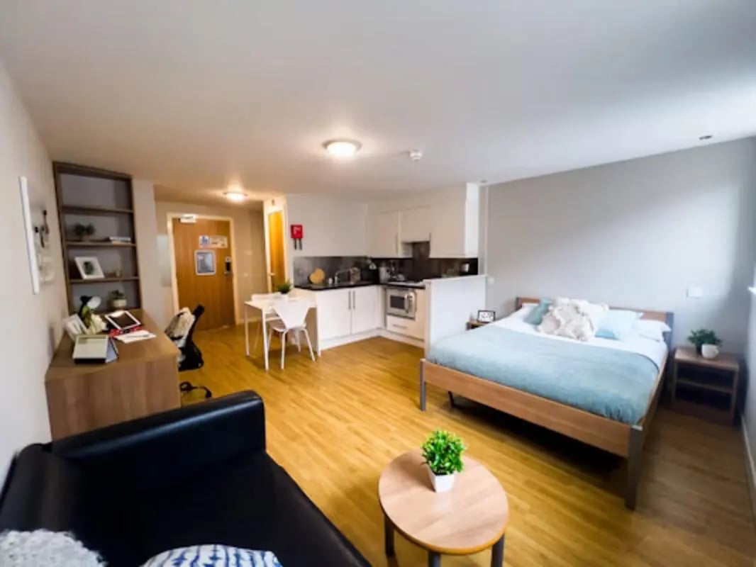 Bed desk kitchen table and sofa studio apartment at Panmure Court in Edinburgh Student Accommodation