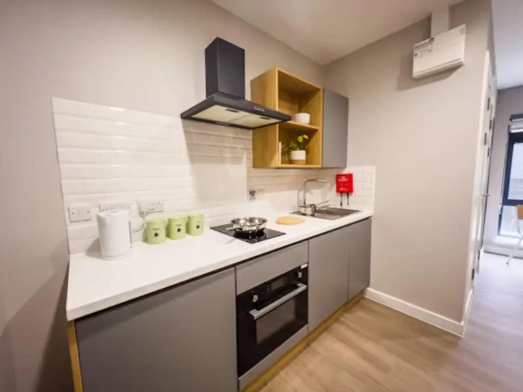White kettle and green canisters kitchen at Panmure Court in Edinburgh Student Accommodation