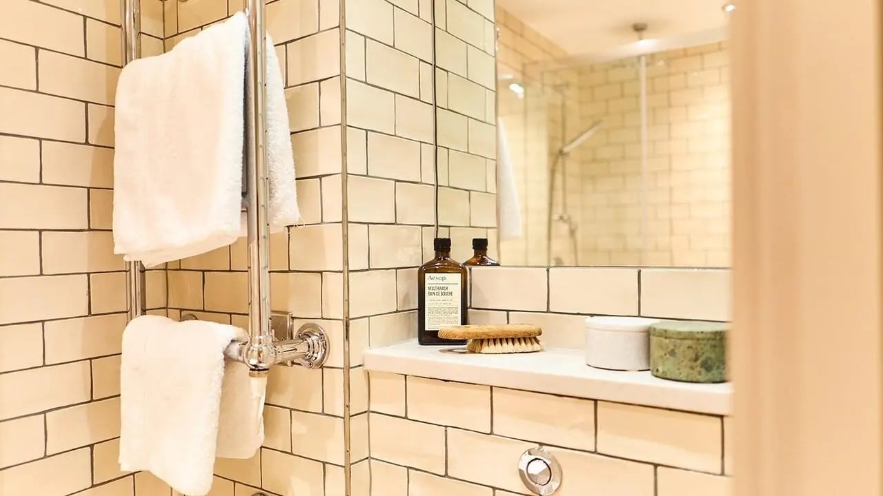 Towels on rackAesop bottle brush bathroom at Canvas The Parade in Cardiff Student Accommodation