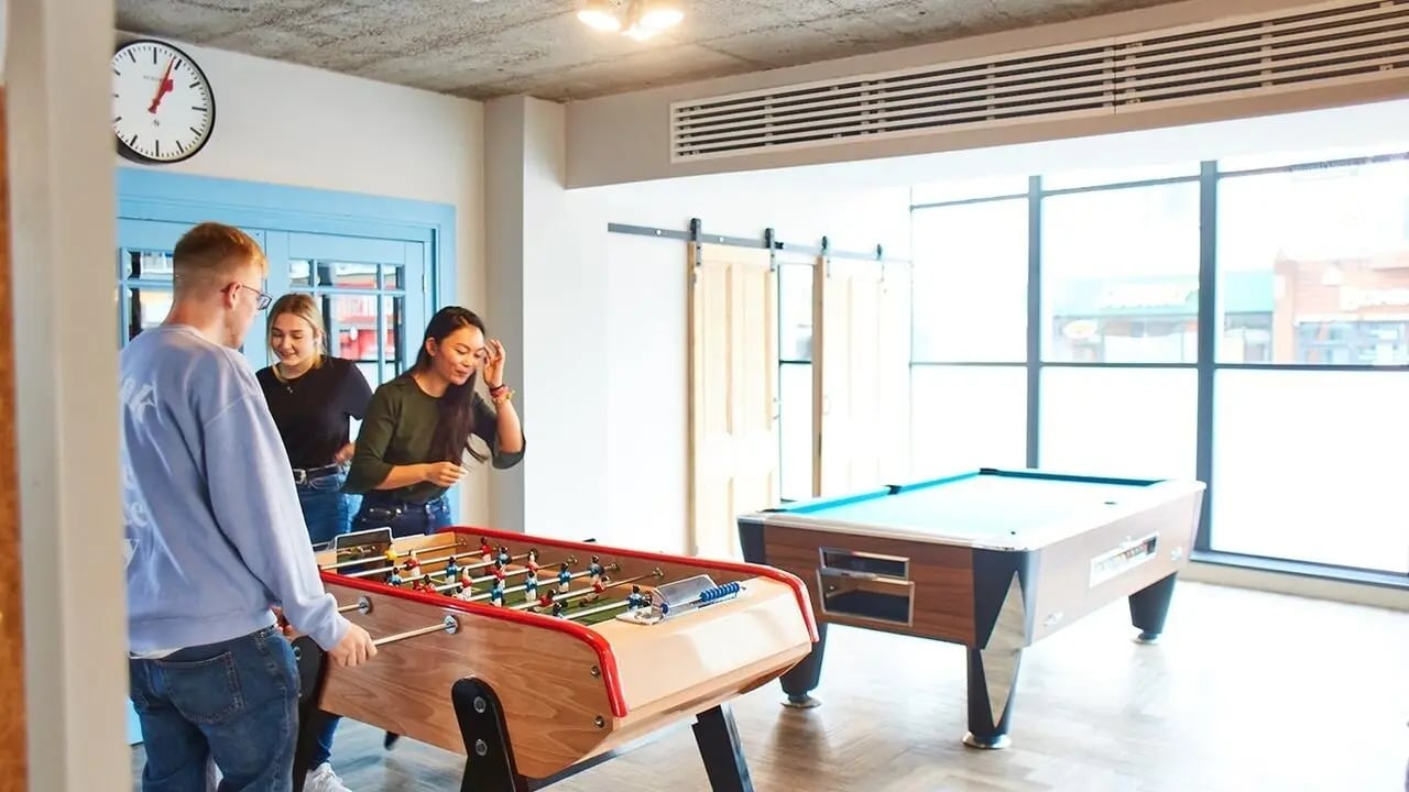 Foosball table and pool table playing area at Canvas The Parade in Cardiff Student Accommodation