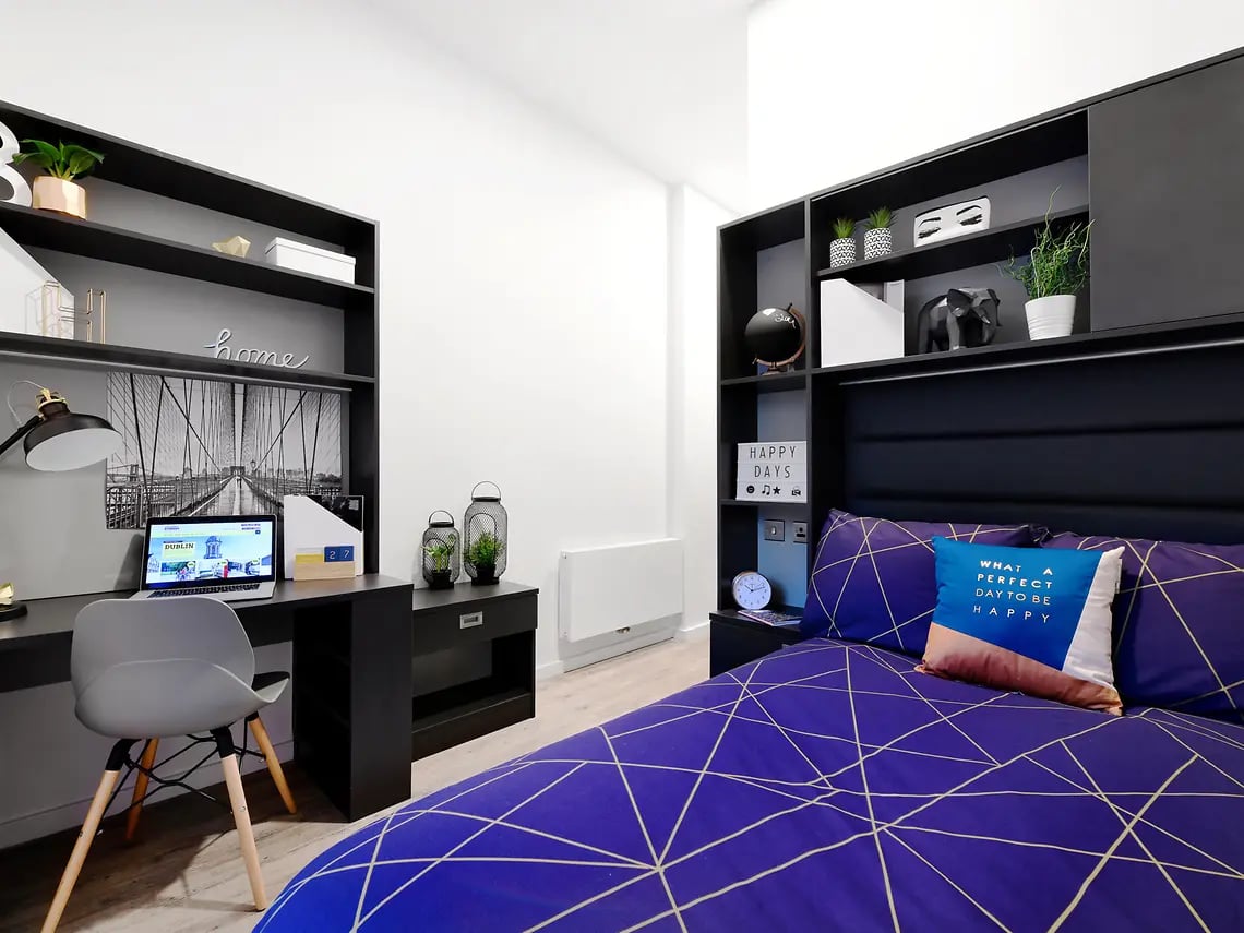 Desk chair laptop bed and shelves bedroom at The Tannery in Dublin Student Accommodation