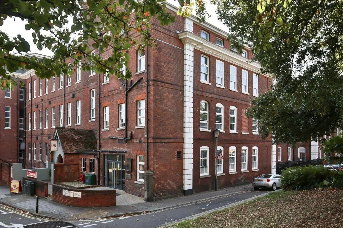 Brick building with many windows exterior at Dean Clarke Lofts in Exeter Student Accommodation