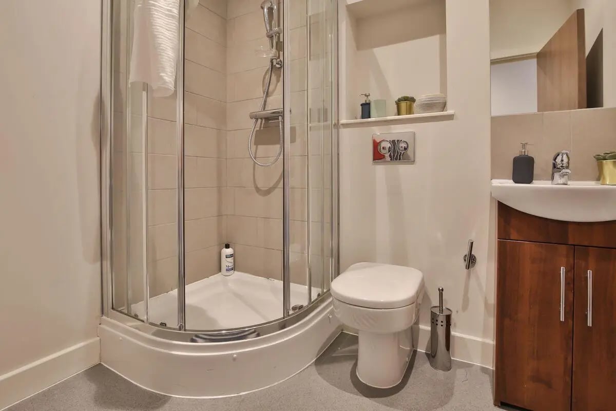 Shower toilet sink and cabinet bathroom at Dean Clarke Lofts in Exeter Student Accommodation