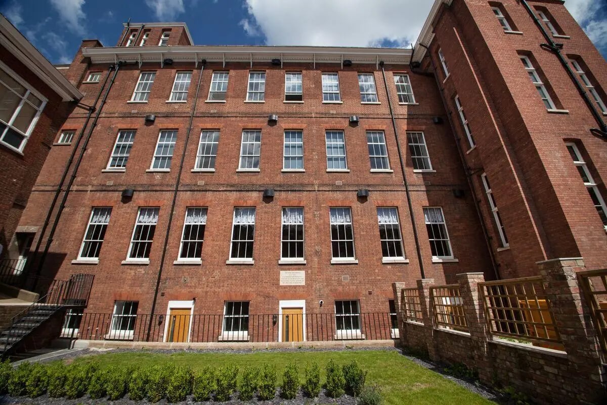 Brick building with many windows and doors Exterior at Dean Clarke Lofts in Exeter Student Accommodation