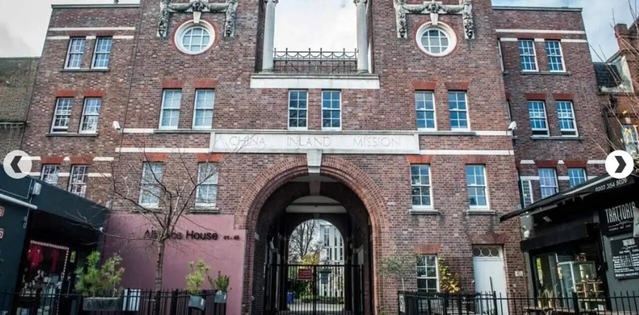 Brick building with archway and windows exterior at Alliance House in London Student Accommodation