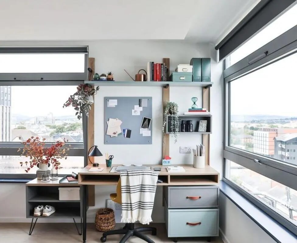 Desk with chair plants and window Study area at Summit House in Cardiff Student Accommodation