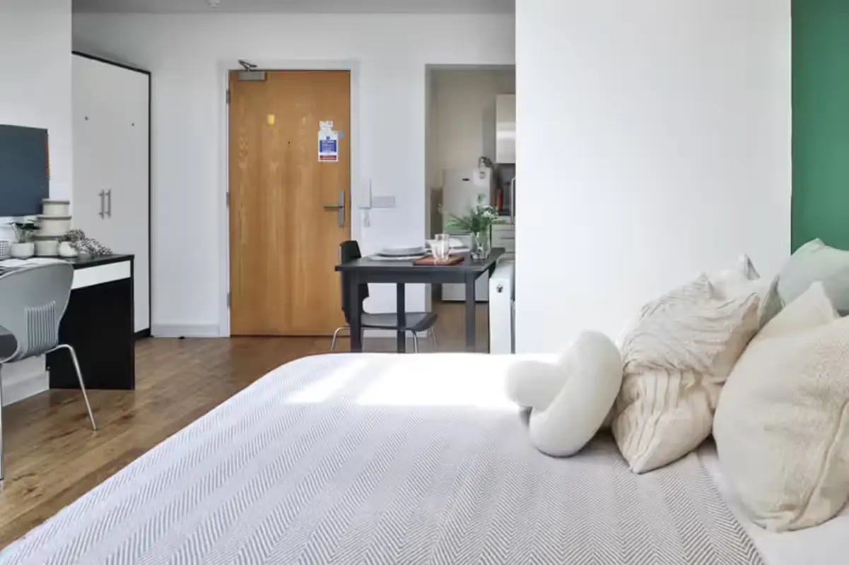 Bed desk dining table and kitchen studio at The Octagon in Liverpool Student Accommodation