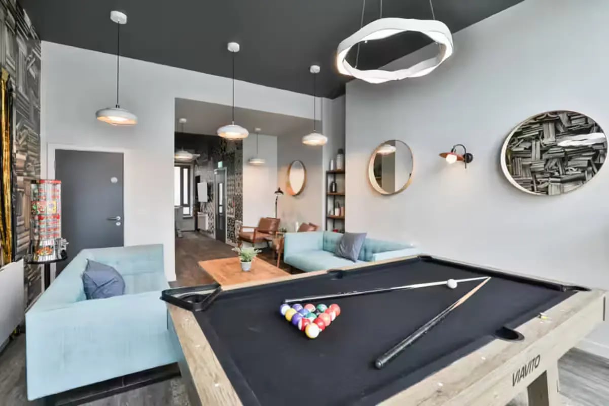 Pool table sofas and lounge area interior at Buccleuch Street in Edinburgh Student Accommodation