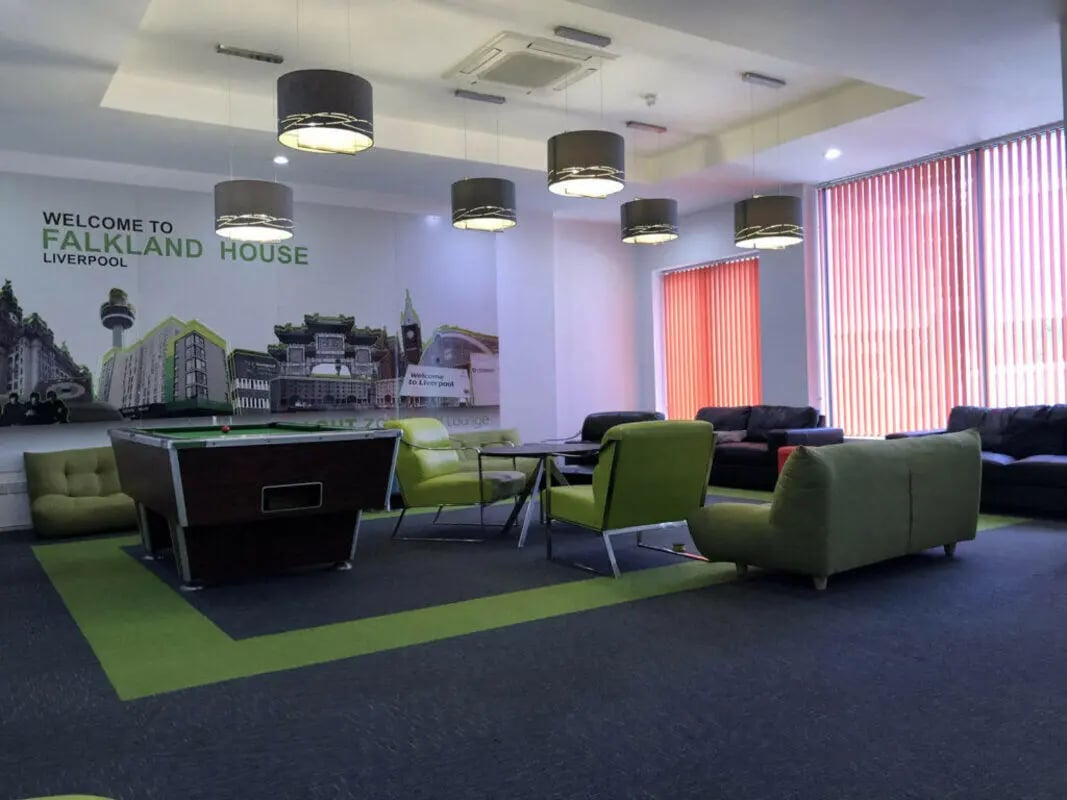 Pool table sofas chairs lounge area living room at Falkland House in Liverpool Student Accommodation