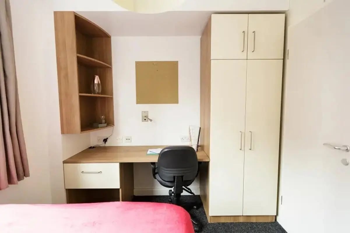 Desk chair shelves wardrobe study area at AXO Camden in London Student Accommodation