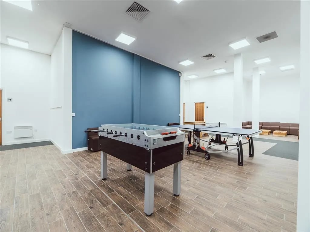 Foosball and ping pong tables common room at Lomax Halls in Stoke-On-Trent Student Accommodation