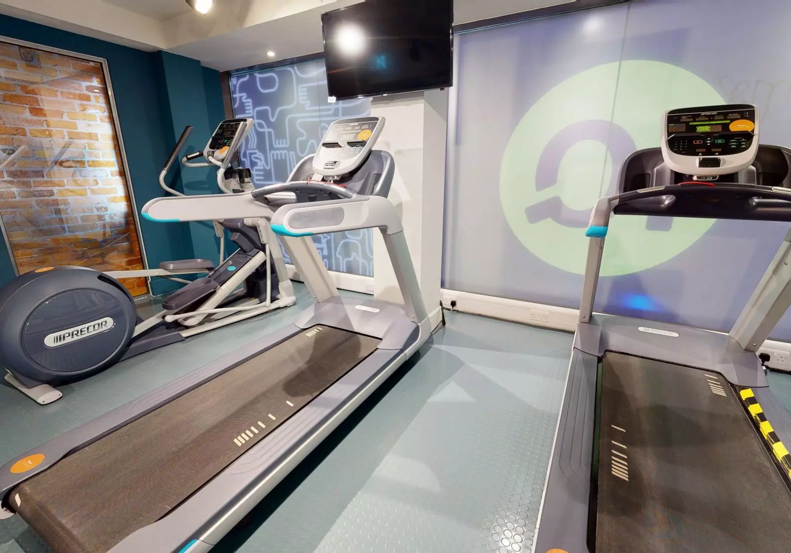 Treadmills and elliptical machine in gym gym at iQ Magenta House in London Student Accommodation