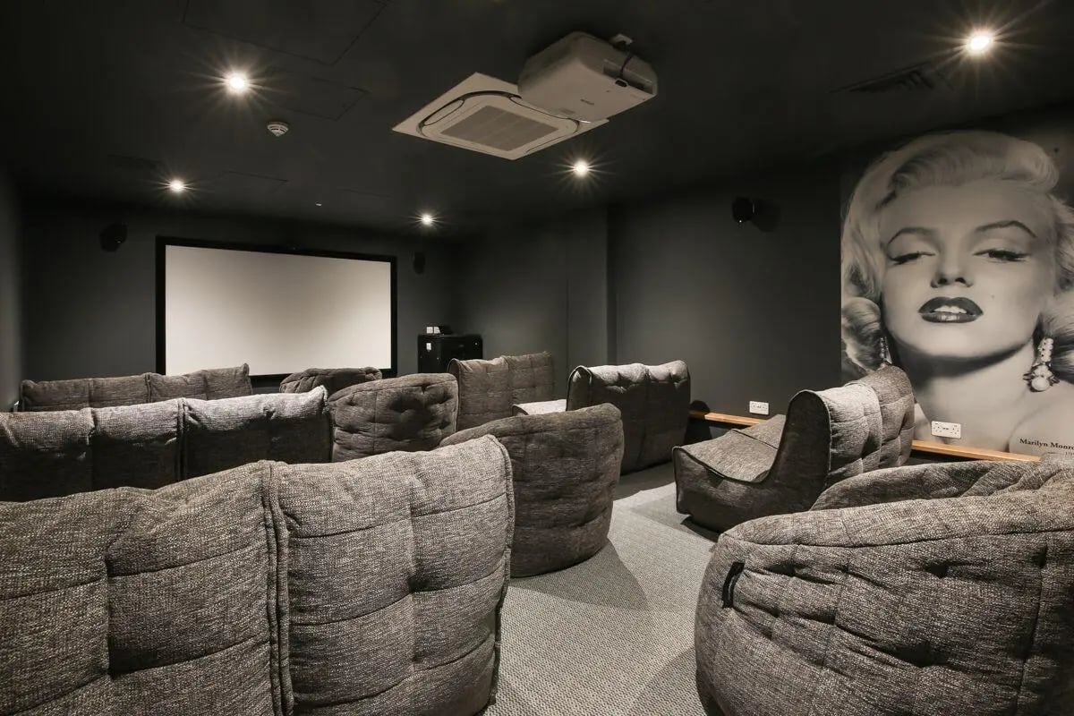 Beanbag chairs and projector screen cinema room at Princess Road East in Leicester Student Accommodation
