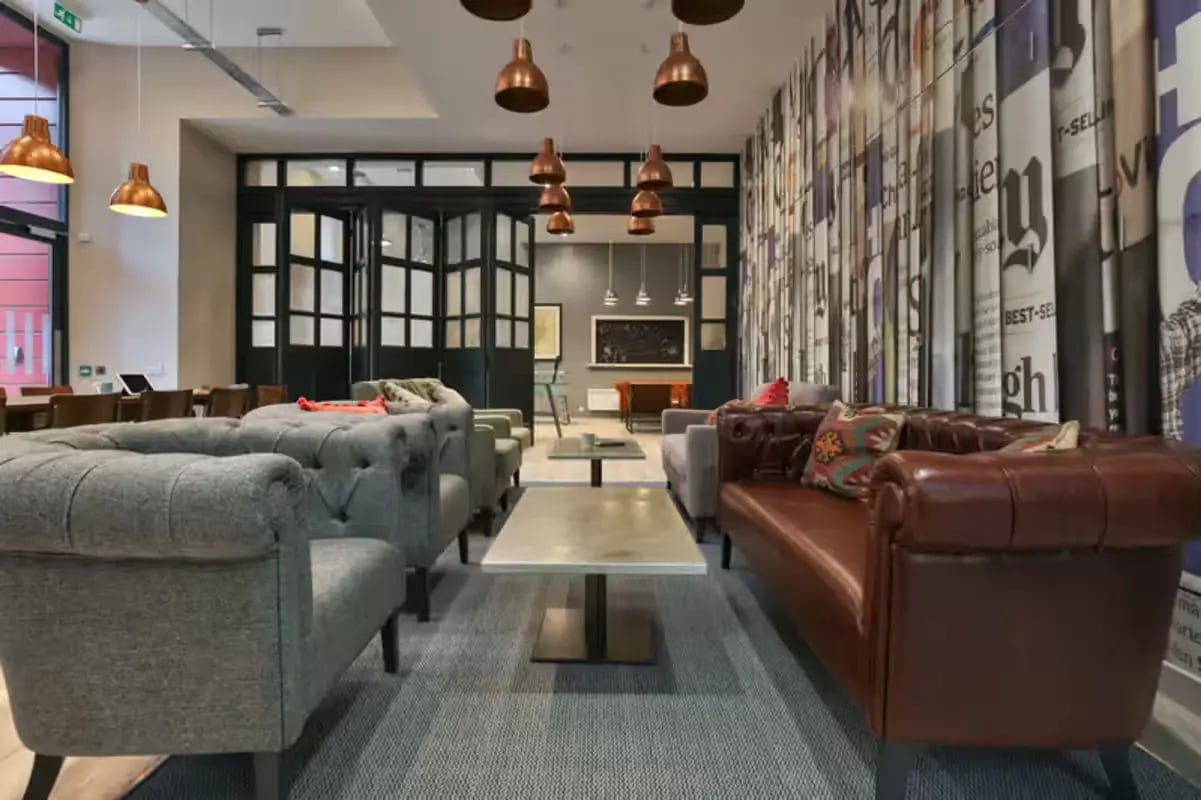 Chesterfield sofas coffee tables seating area at Willowbank in Glasgow Student Accommodation