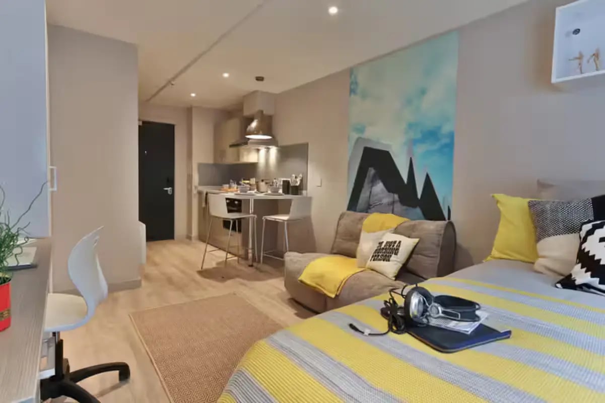 Desk kitchen sofa bed with art living room at Willowbank in Glasgow Student Accommodation