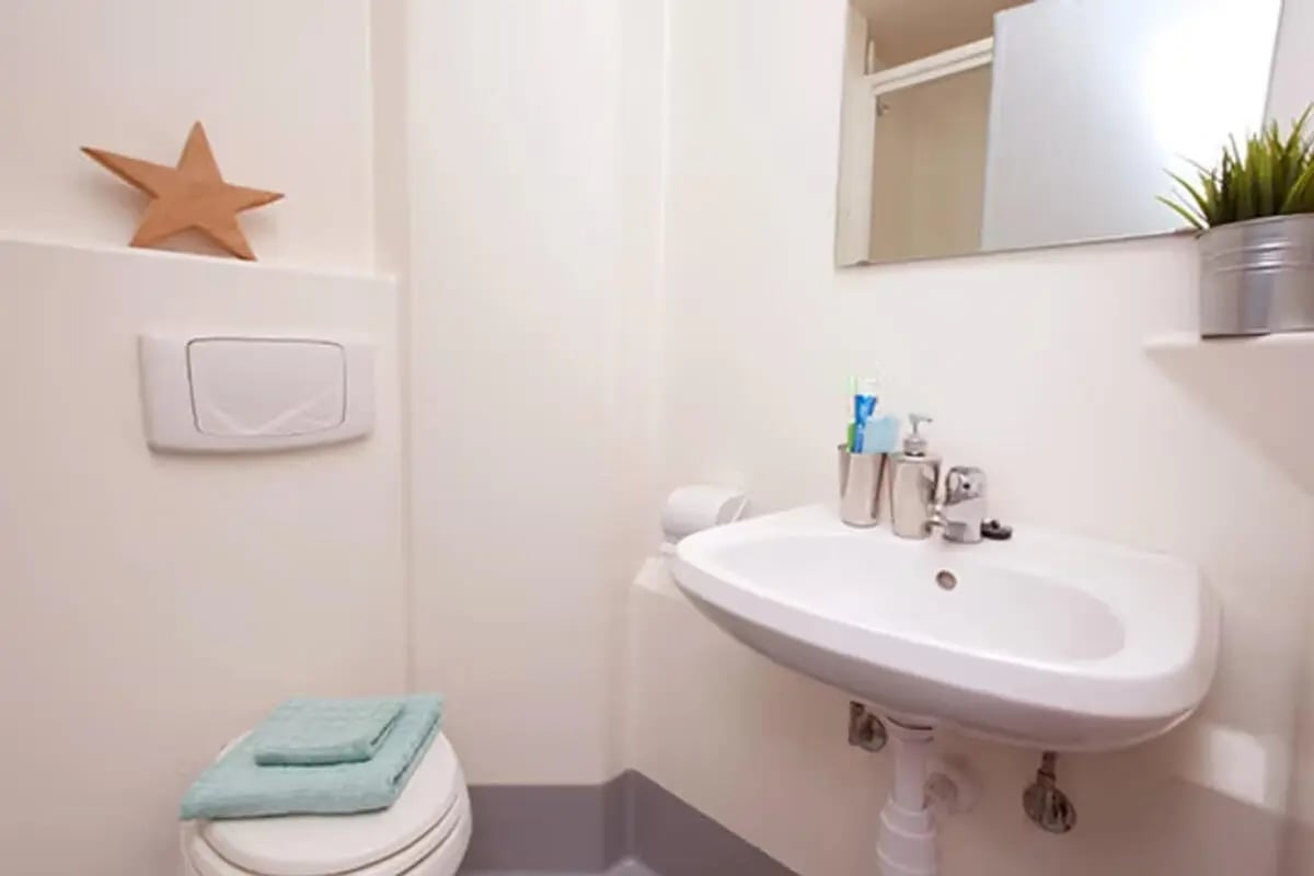 Toilet sink and toiletries bathroom at The Plaza in Leeds Student Accommodation
