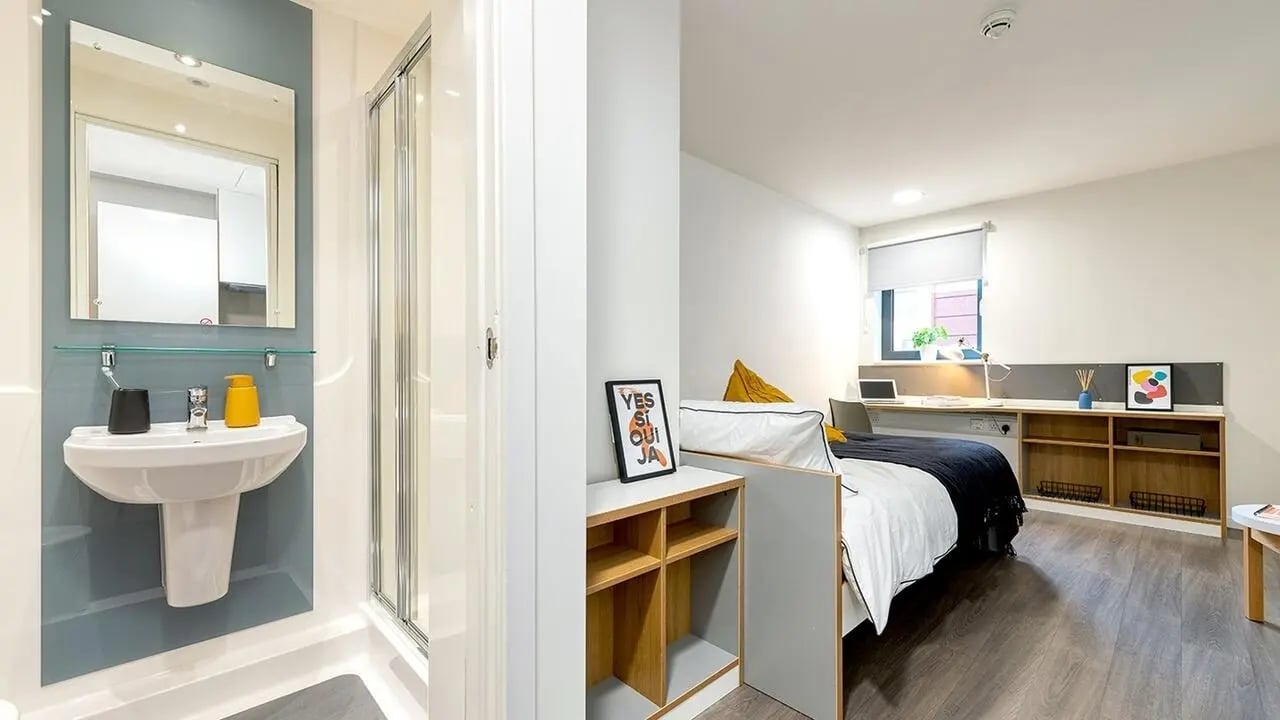 Sink shower bed desk shelves room at Collegiate Merlin Heights in Leicester Student Accommodation