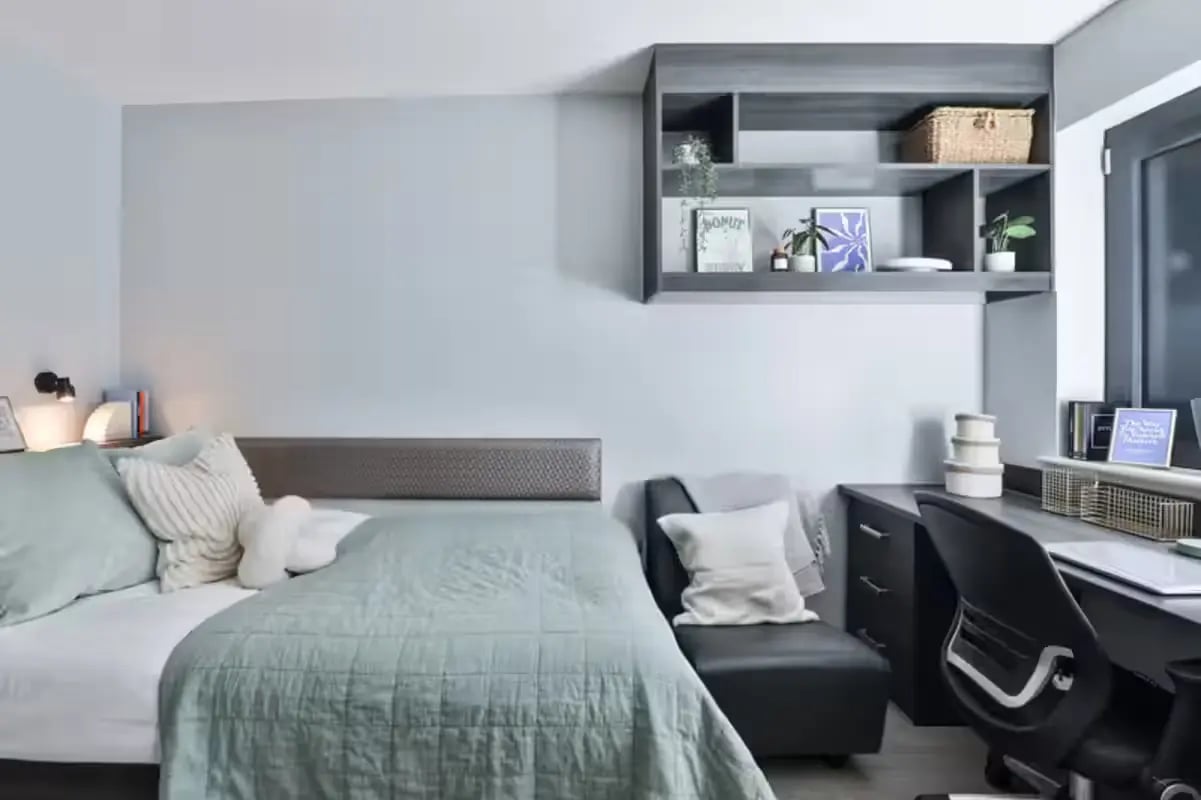 Bed desk chair shelves study area bedroom at Windsor House in Cardiff Student Accommodation