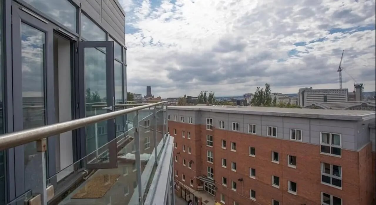 Balcony railing glass doors city view Exterior at Windsor Court in Liverpool Student Accommodation