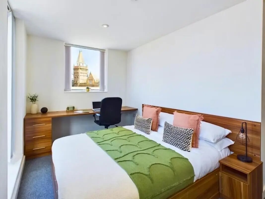 Bed desk chair and building view bedroom at Windsor Court in Liverpool Student Accommodation