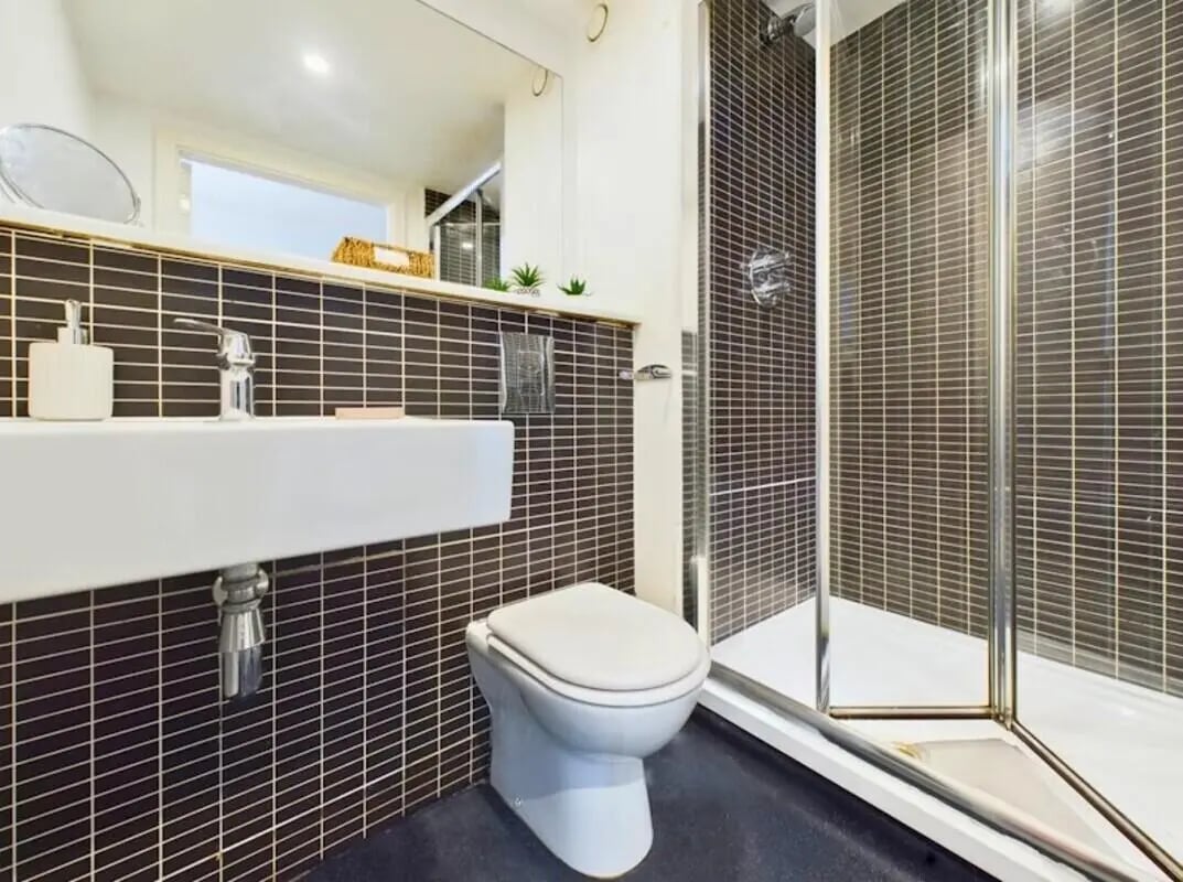 Toilet sink and shower stall bathroom at Windsor Court in Liverpool Student Accommodation