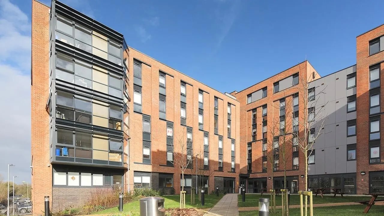 Brick building with large windows exterior at Collegiate Riverside Way Winchester in Winchester Student Accommodation