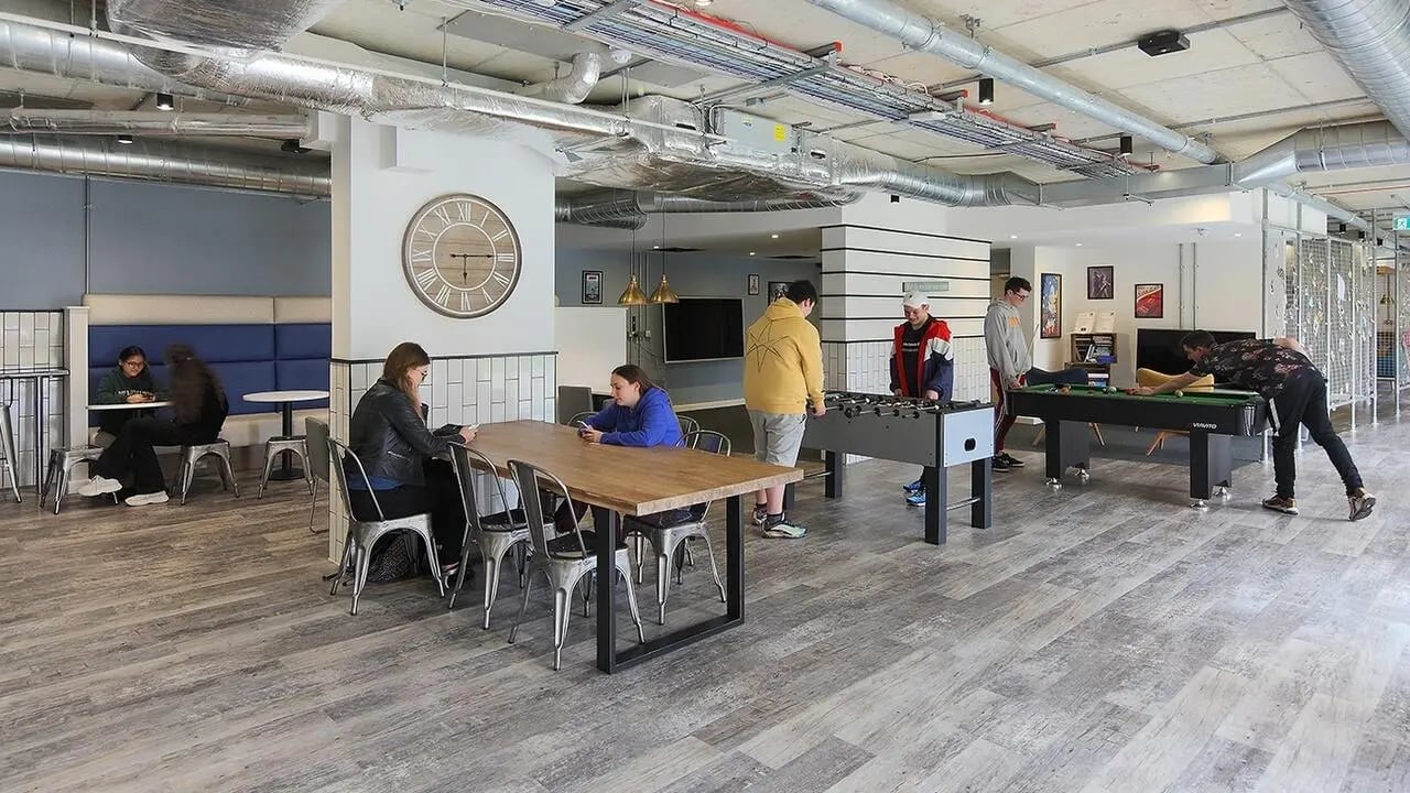Foosball and pool tables in communal area at Collegiate Riverside Way Winchester in Winchester Student Accommodation