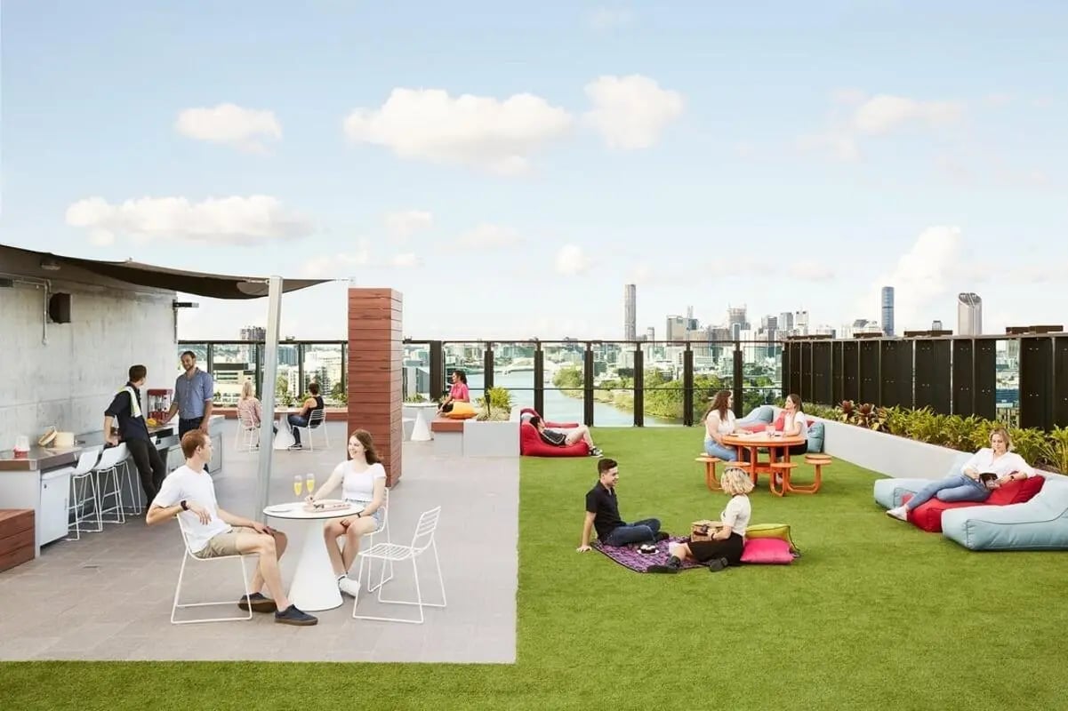 Rooftop amenity space with seating and city views outdoor area at Scape Toowong in Brisbane Student Accommodation