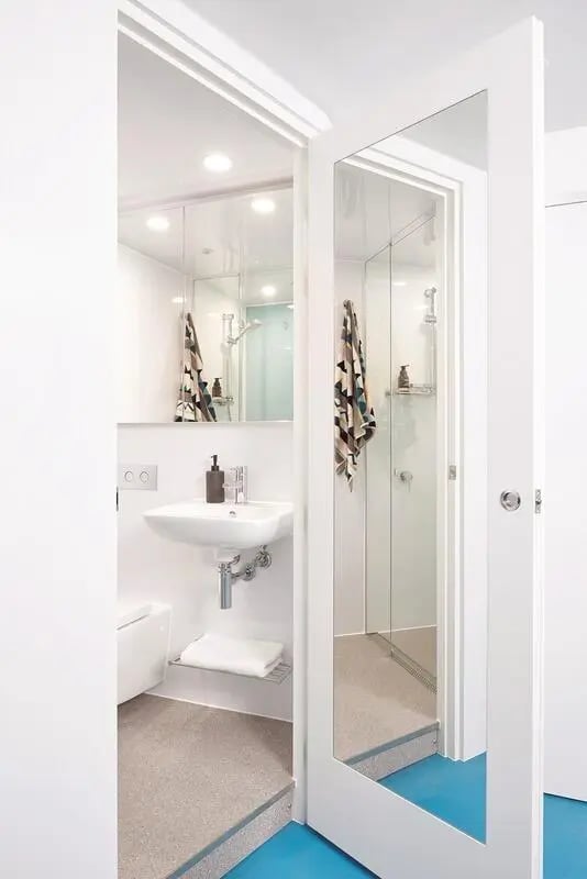 Sink toilet towel shower visible bathroom. at Scape Toowong in Brisbane Student Accommodation