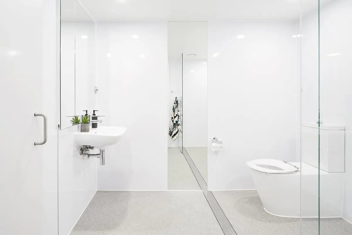 White sink toilet and mirror Bathroom at Scape Toowong in Brisbane Student Accommodation