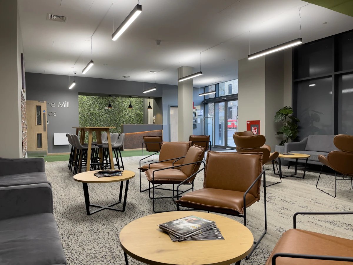 Chairs tables sofa reception area lounge at Justice Mill Studios in Aberdeen Student Accommodation