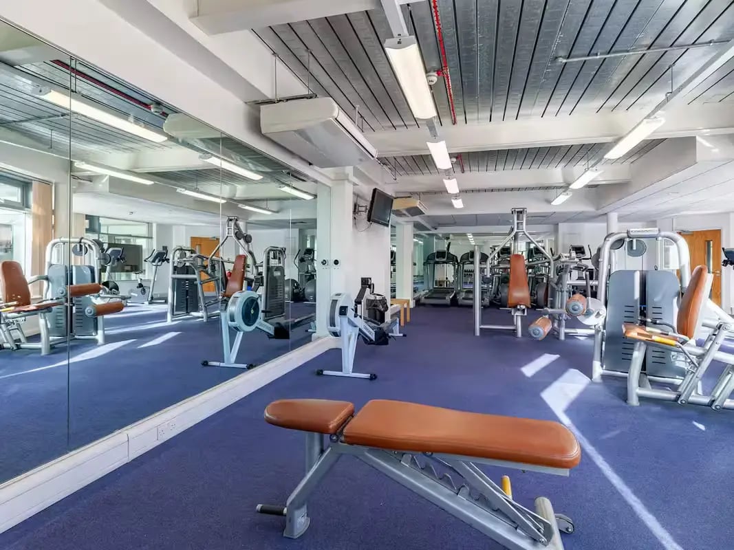 Weights machines rowing machines treadmills bench Gym at Polhill Park in Bedford Student Accommodation