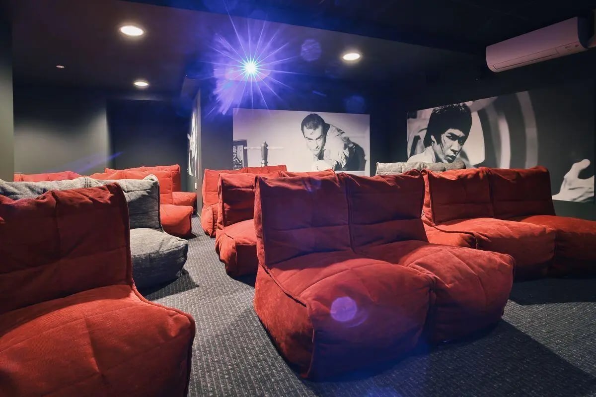 Beanbag chairs with movie posters playing area at George Street Apartments in Glasgow Student Accommodation