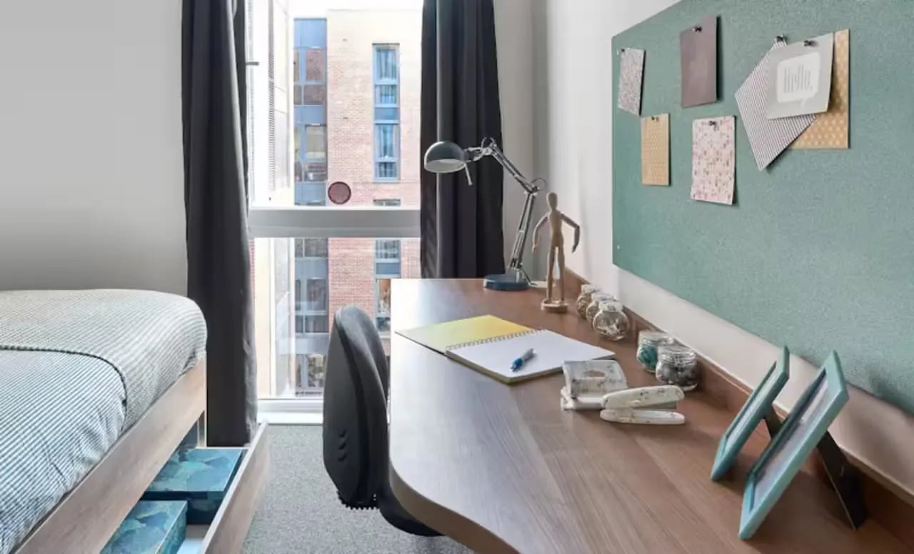 Bed desk lamp photos and art board bedroom at The Elements in Sheffield Student Accommodation